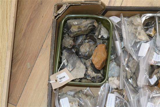 A stone fishing/loom weight and a large collection of prehistoric flint tools,